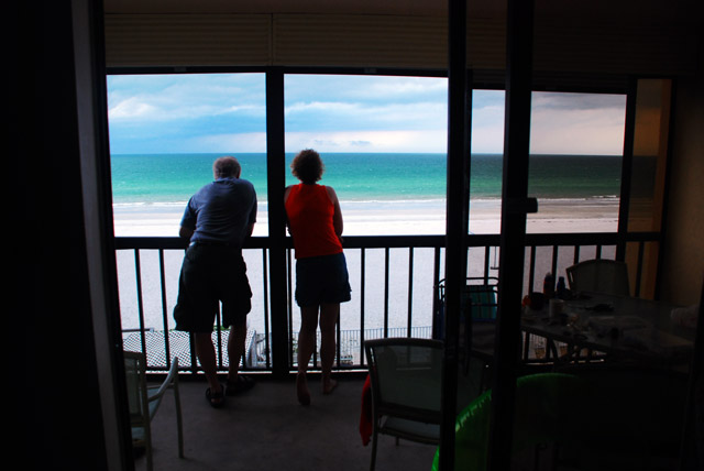parents-overlooking-balcony-of-condo
